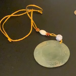 Jade necklace with silk cord